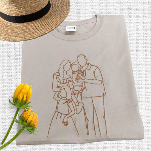 Custom family photo outline embroidery on a T-shirt