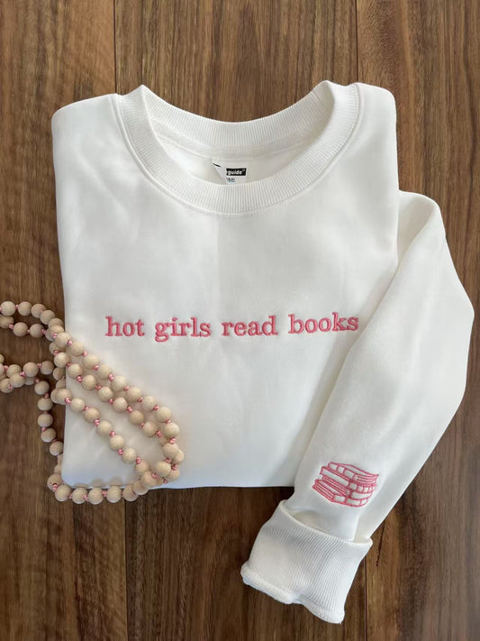 white embroidered sweatshirt with 'Hot Girls Read Books' text, minimalist book lover gift.